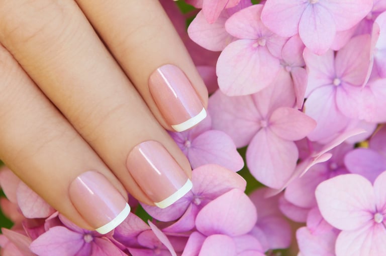 Short pink lilac French manicure with hydrangea flower